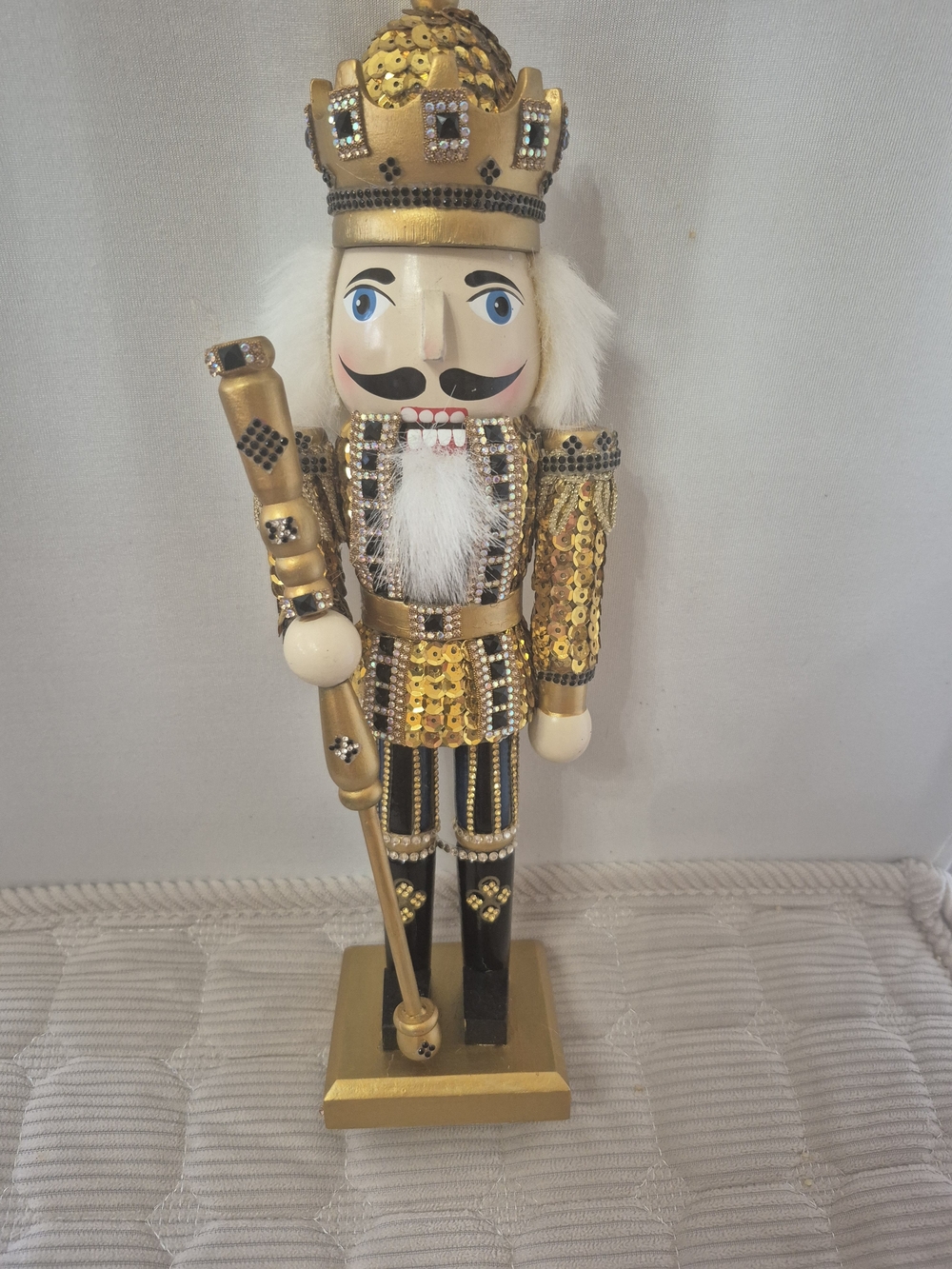 Gold and Black Sequin Nutcracker Figurine
